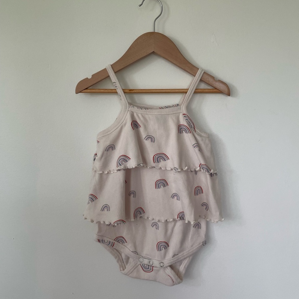Kate Quinn Tiered Onesie with Rainbow Print